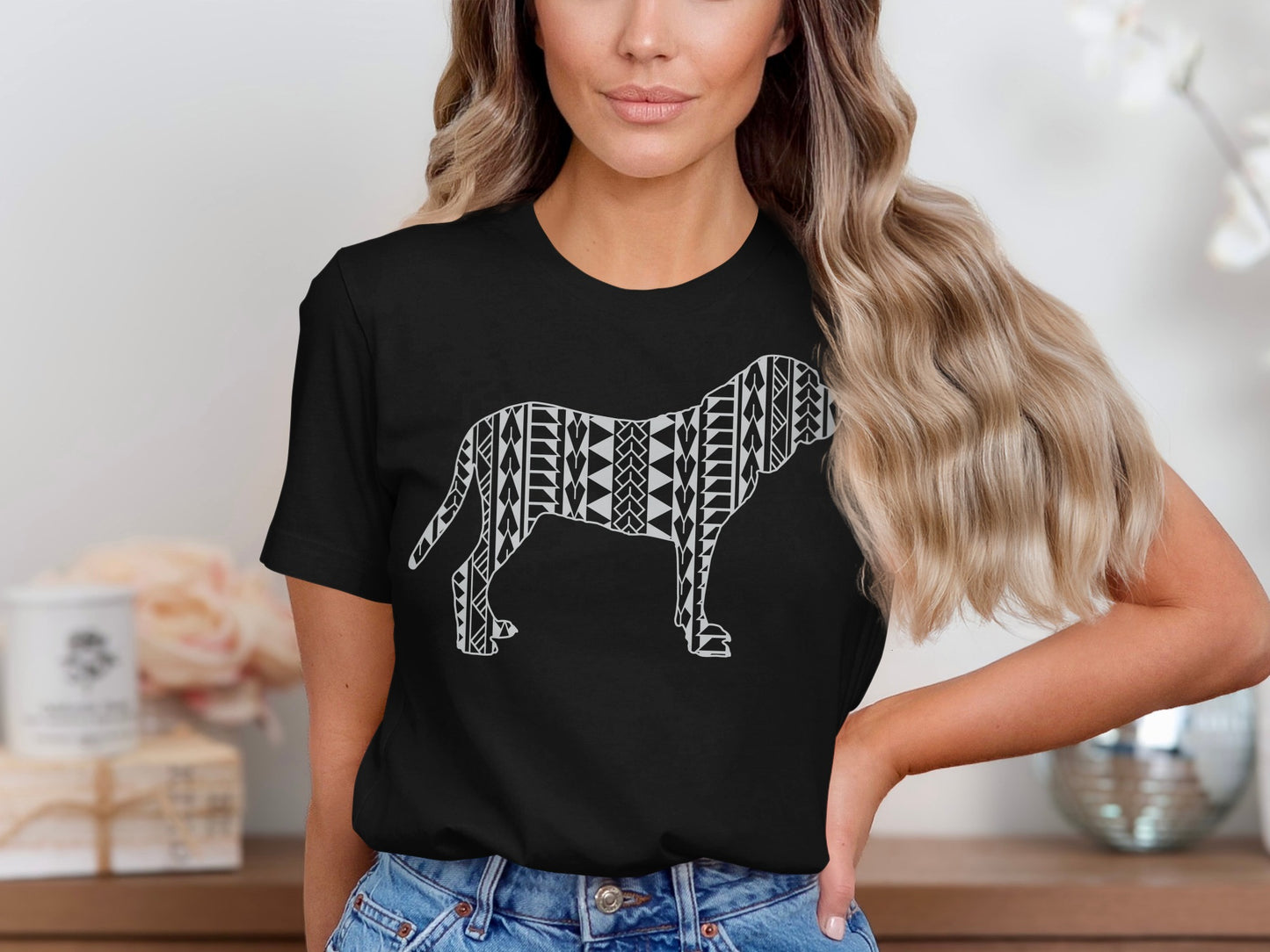Black t-shirt with a white tribal dog design.