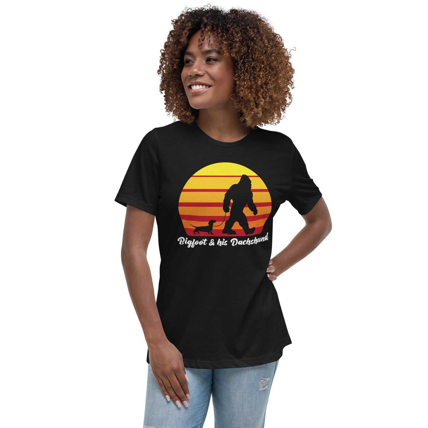 Big foot and his Dachshund women’s black t-shirt by Dog Artistry.