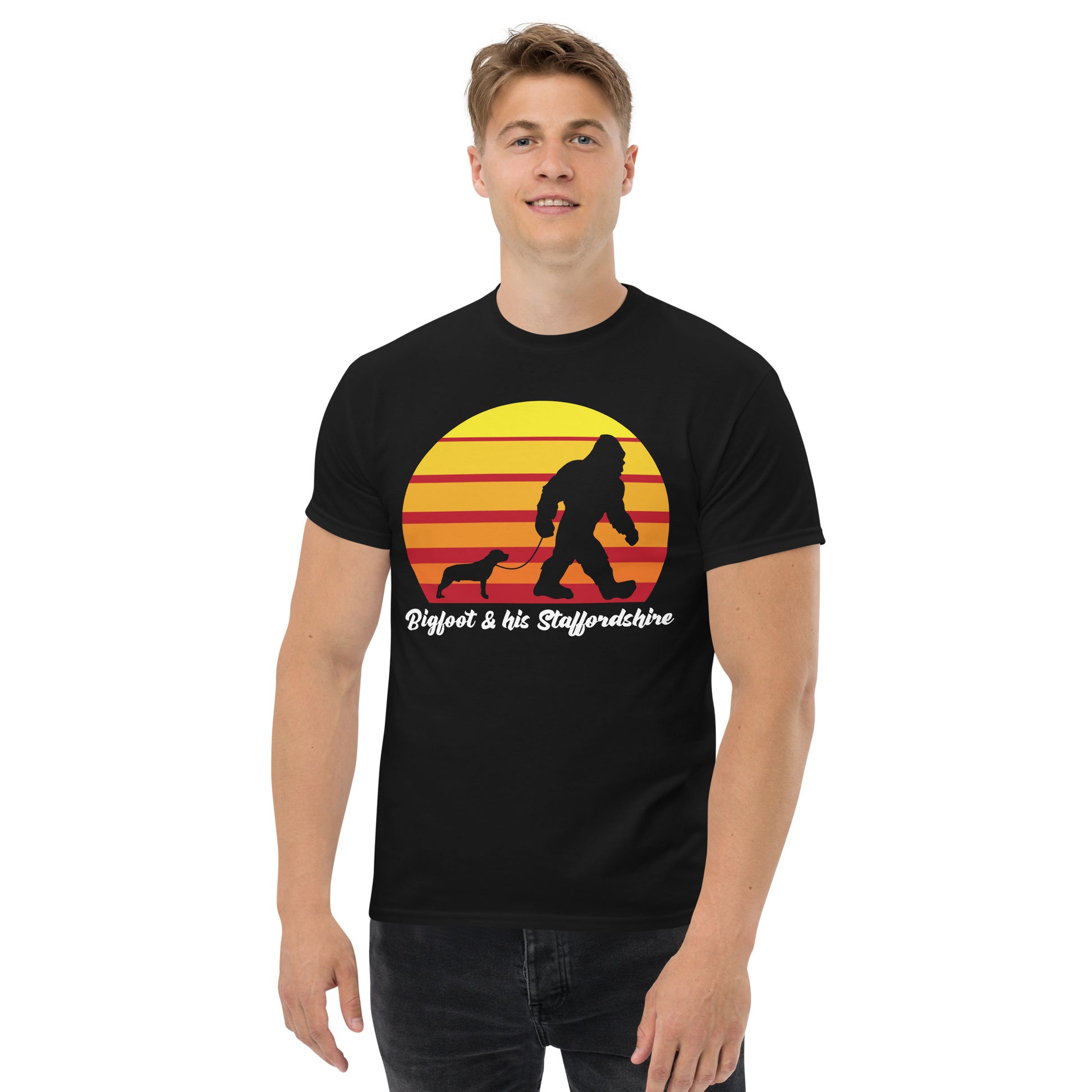 Bigfoot and his Staffordshire Bull Terrier men’s black t-shirt by Dog Artistry.