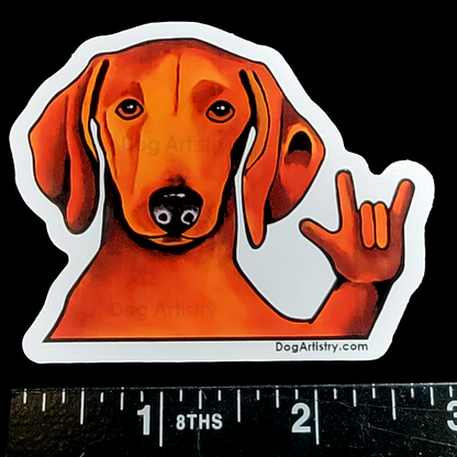 Dog Artistry Dachshund Die-Cut Vinyl Sticker doing the love sign.