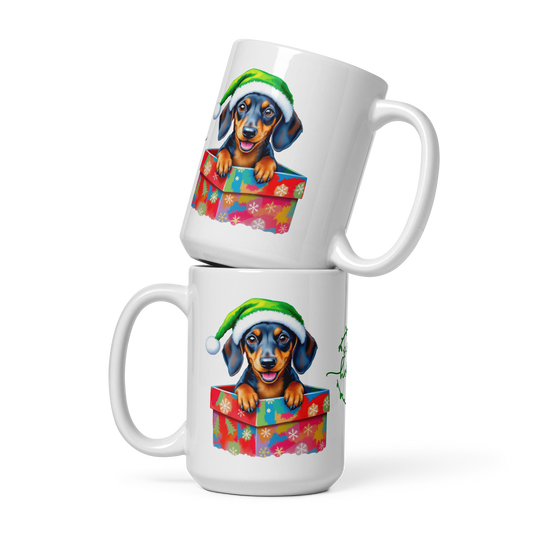 Dachshund Puppy Wearing Santa Hat Coming Out of a Present White Glossy Mug