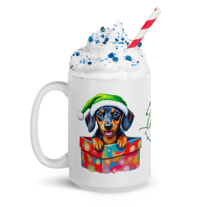 Dachshund Puppy Wearing Santa Hat Coming Out of a Present White Glossy Mug