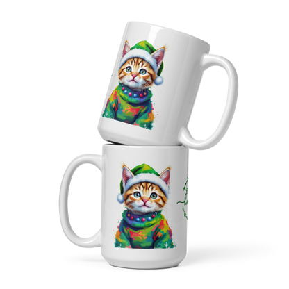 Kitten Wearing Colorful Sweater and Green Santa Hat White Glossy Mug