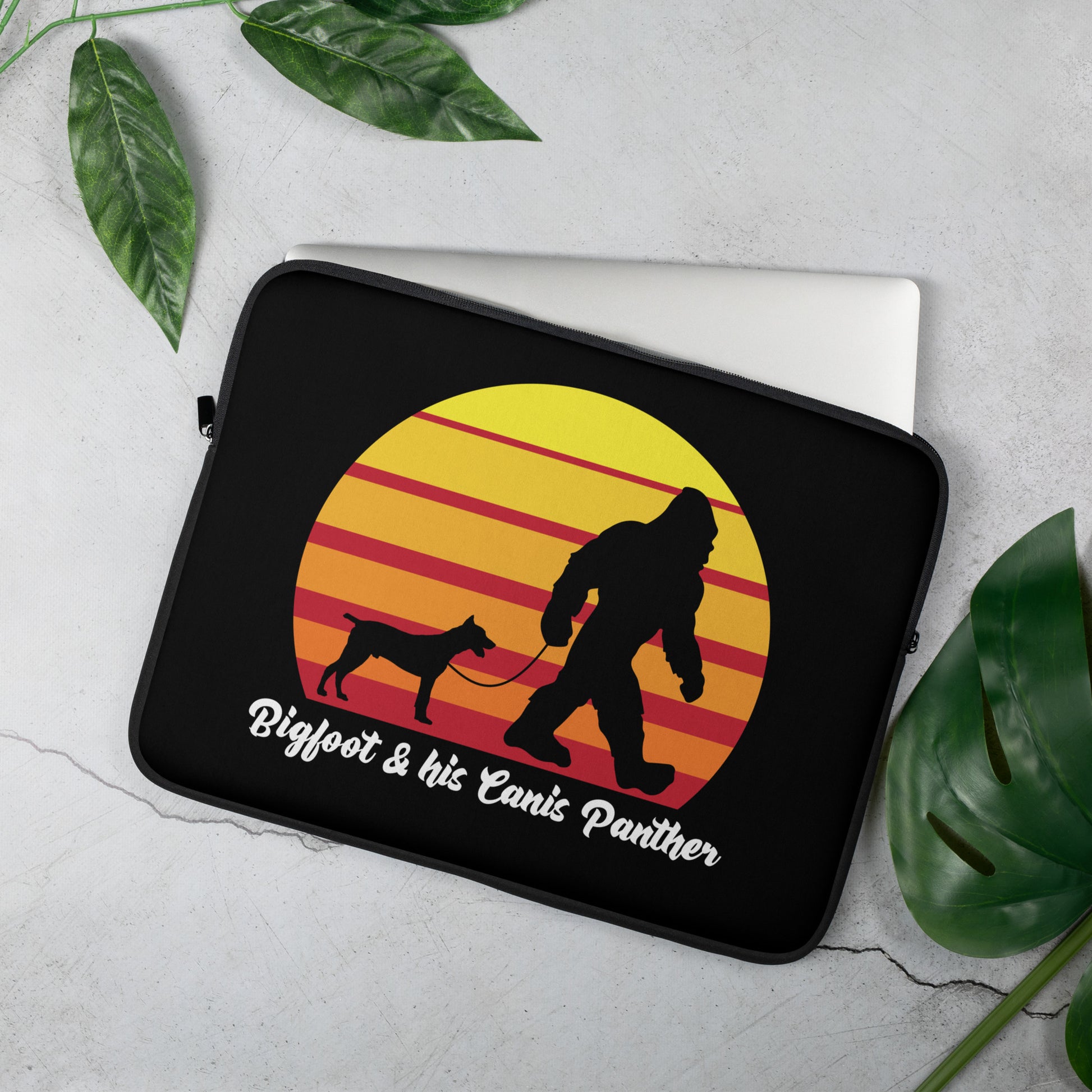 Bigfoot and his Canis Panther Laptop Sleeve by Dog Artistry.