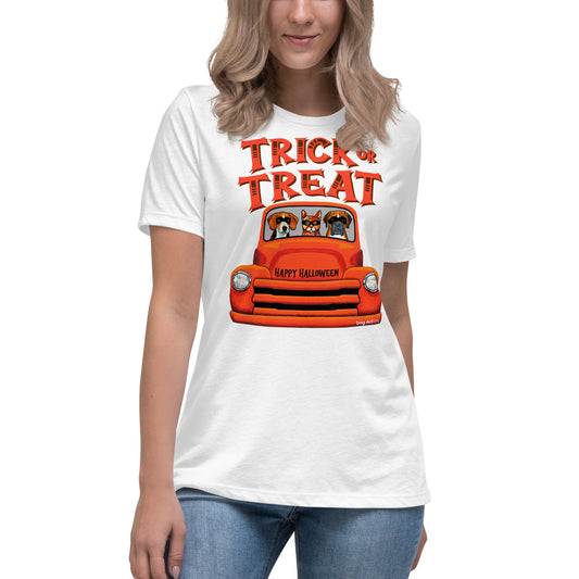 Trick or Treat Halloween old orange truck with Beagle, Cat, and Boxer wearing masks women’s white t-shirt by Dog Artistry.